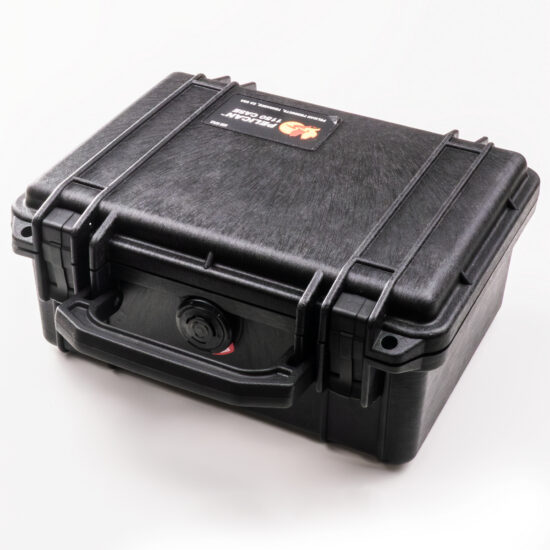 A black, toolbox-sized Pelican case is shown closed on a white table