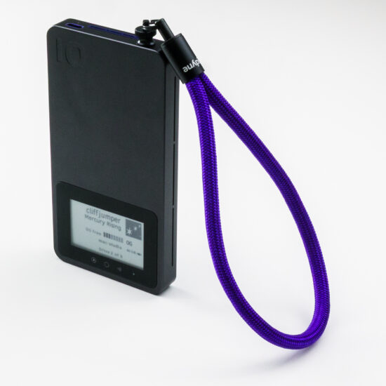A thick, purple, climbing-rope like lanyard is shown attached to a vertical Pro Mini accessory port. It is roughly 125% the height of Pro Mini