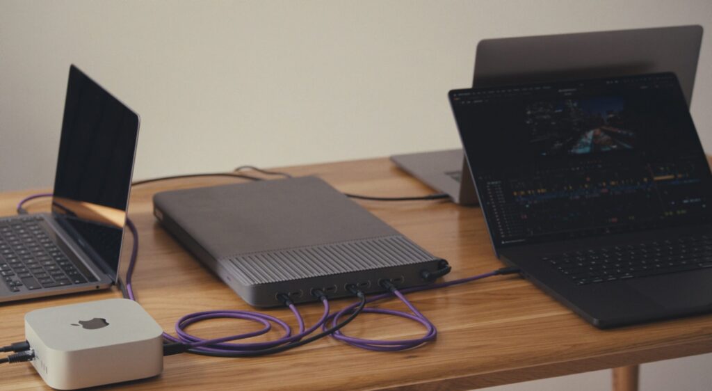 Pro Data storage device on desk attached to two laptops and a mac studio