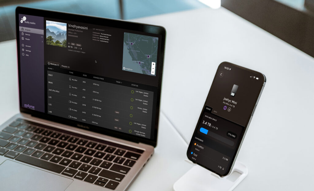 laptop screen and smart phone screen showing a dashboard for data storage fleet management